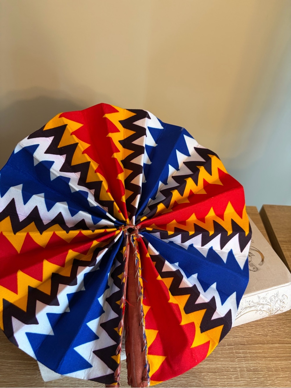 Handheld Foldable Fan with Bold Red, Blue & Yellow Geometric Print - Picture 3 of 3